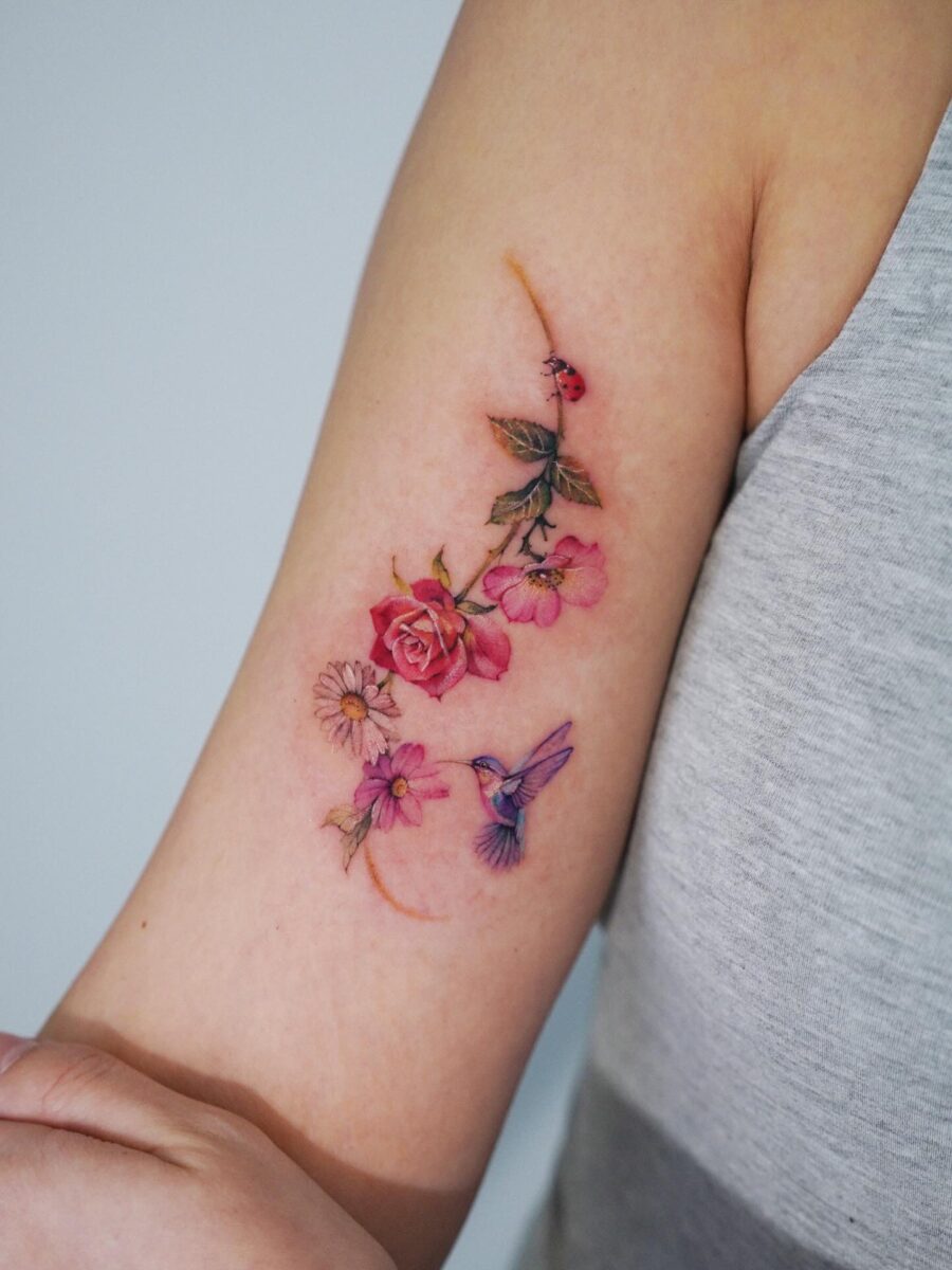 Charming floral and bird tattoo design blend Tattoo on skin