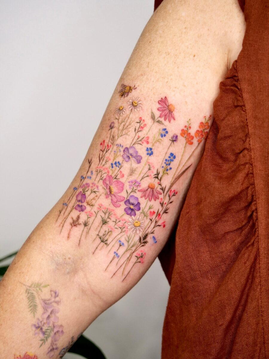 Colorful floral arm tattoo illustration Tattoo on skin