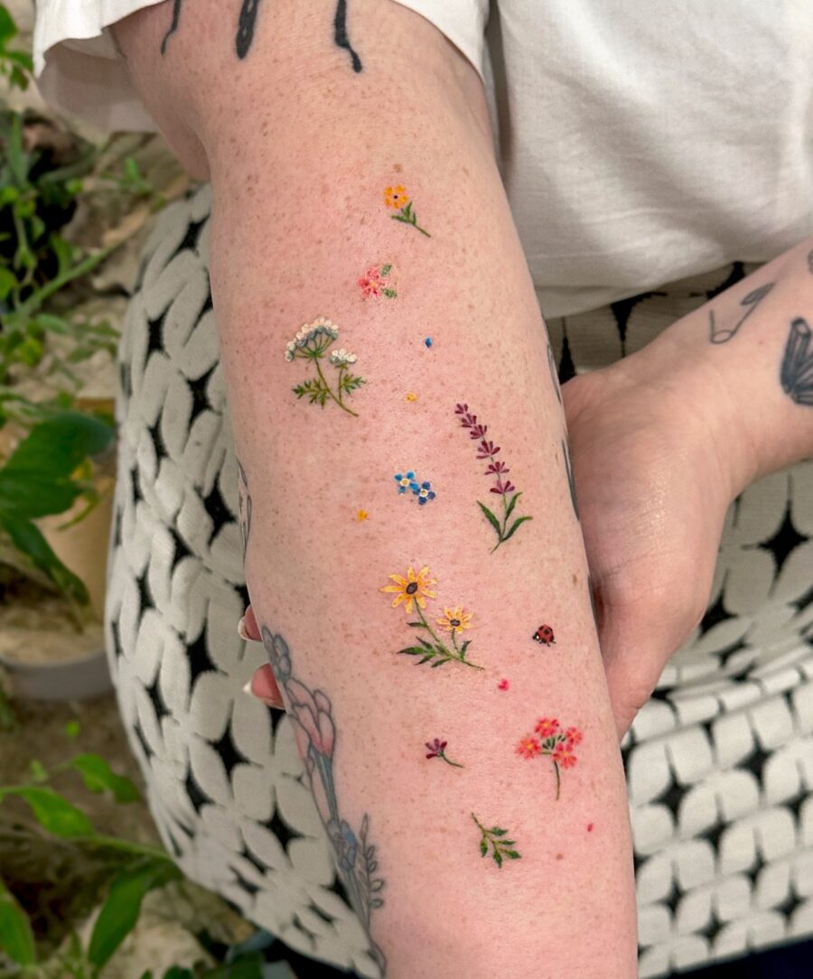 Colorful floral tattoos celebrating birth months Tattoo on skin