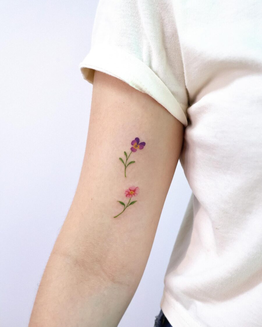 Delicate birth flower tattoos on arm Tattoo on skin