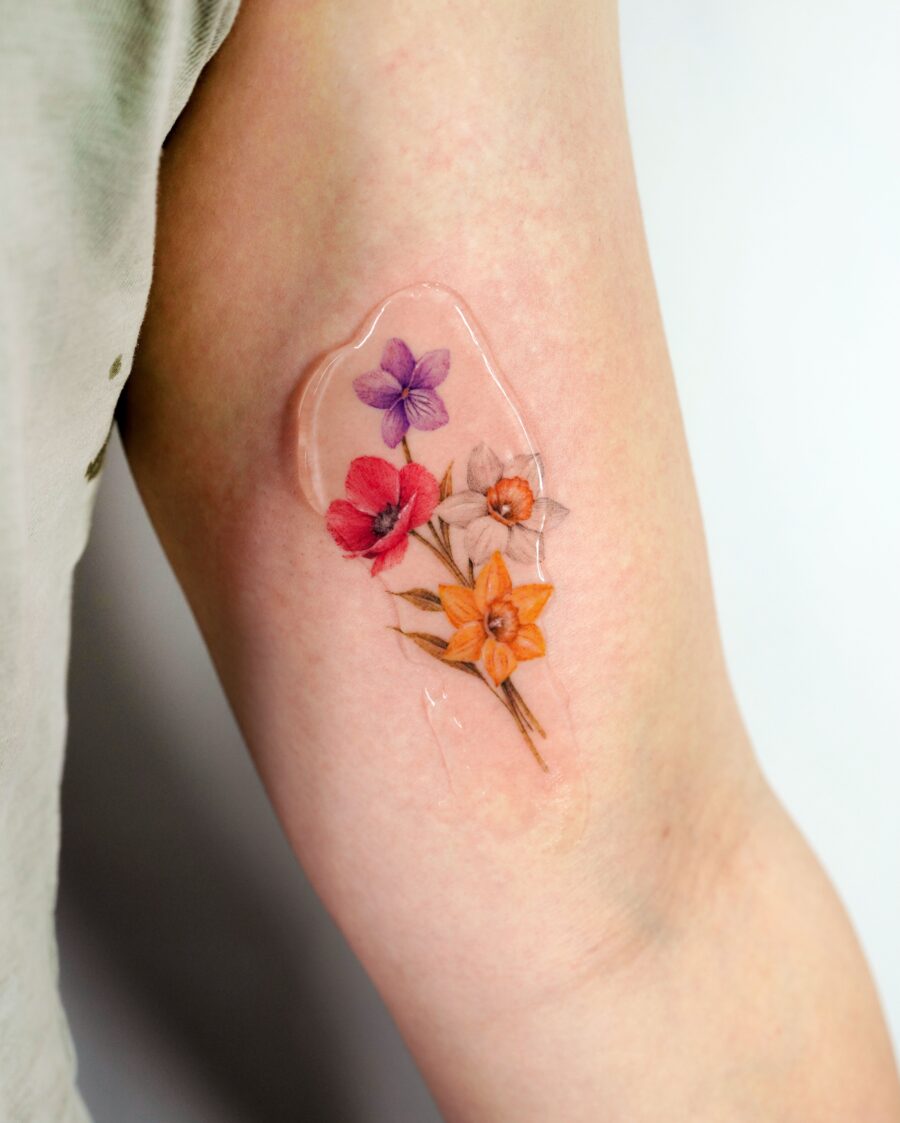 Stunning floral tattoo with vibrant colors Tattoo on skin
