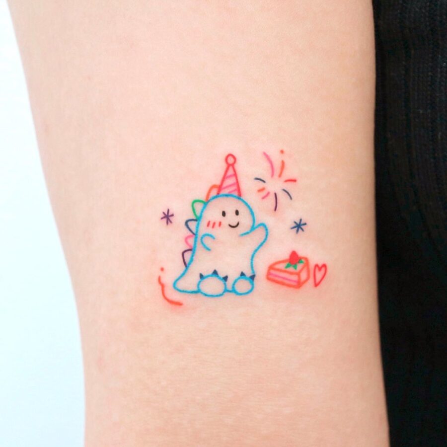 Adorable Birthday Dinosaur Tattoo With Celebration Vibes Tattoo on skin