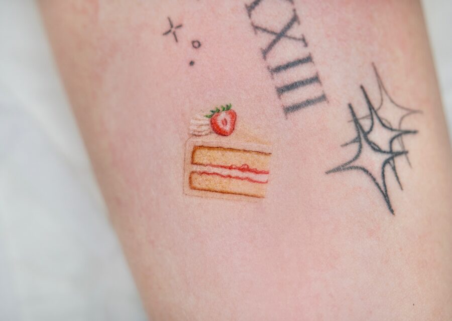 Celebrate with a sweet cake tattoo design Tattoo on skin