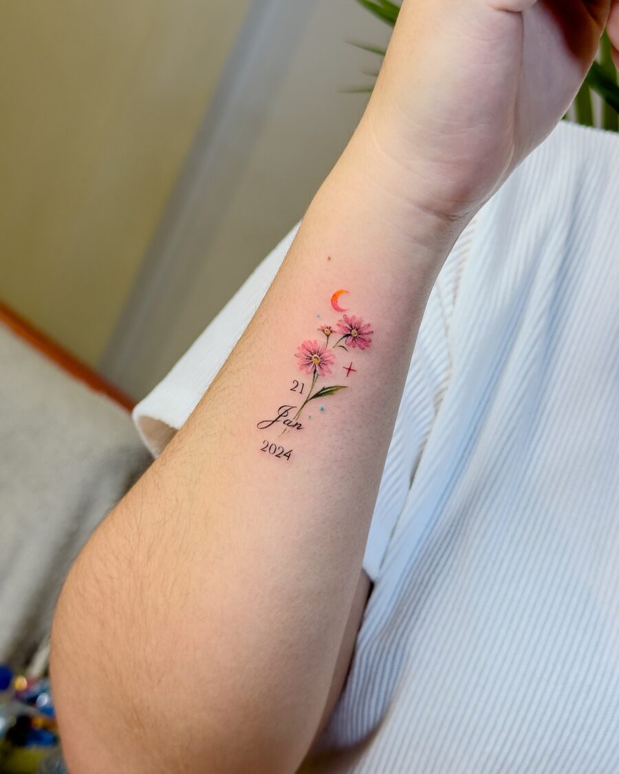 Charming floral birthday tattoo design with date Tattoo on skin