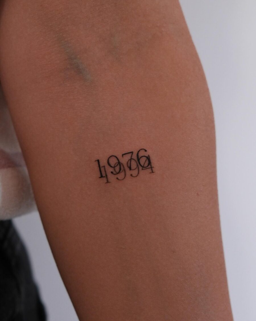 Minimalist Tattoo Celebrating a Special Year Tattoo on skin