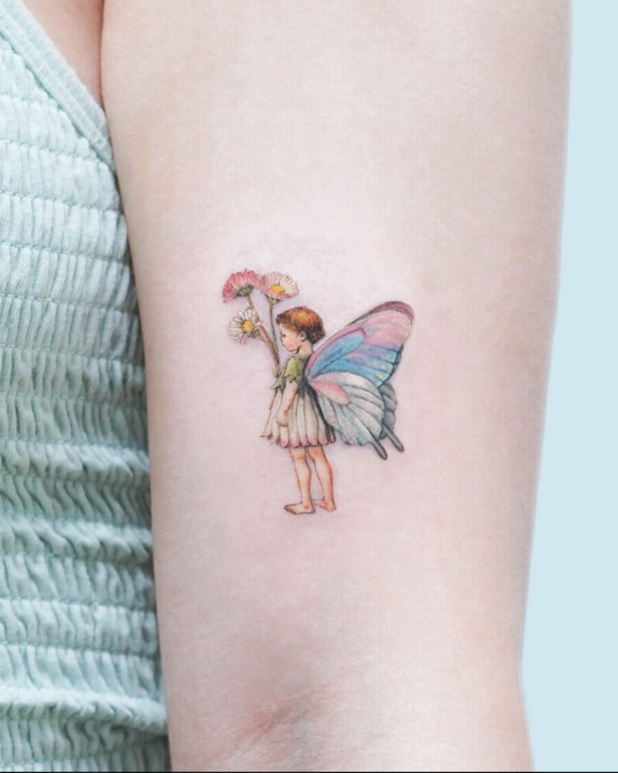 Whimsical fairy tattoo celebrating birthdays joyfully Tattoo on skin
