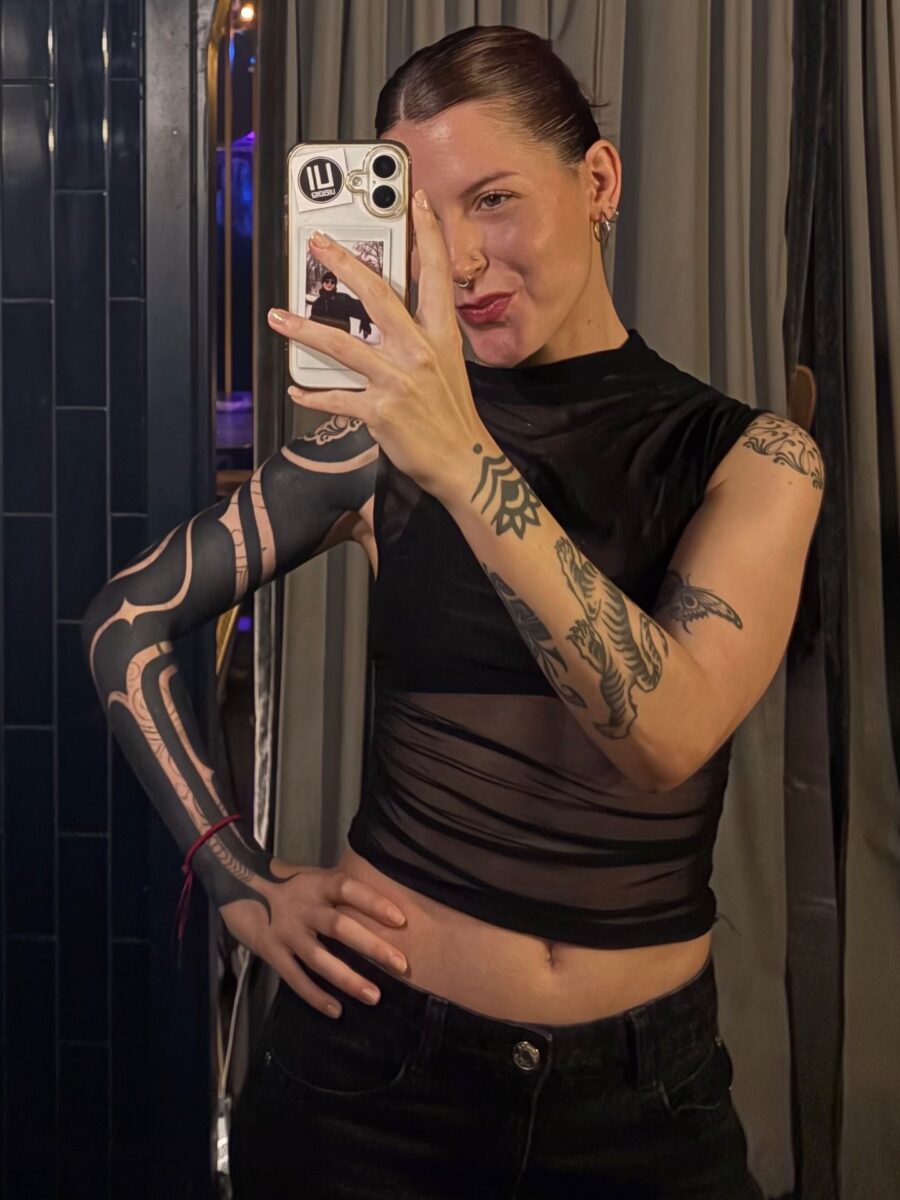 Bold black sleeve tattoo showcasing unique designs Tattoo on skin