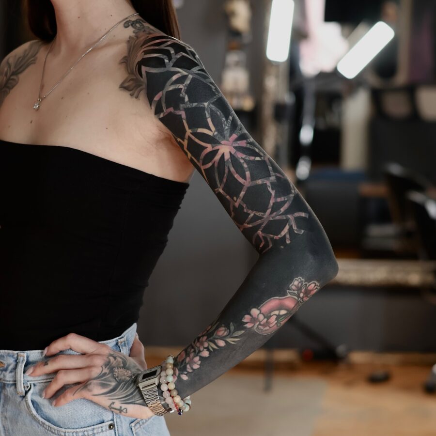 Elegant floral black sleeve tattoo design Tattoo on skin