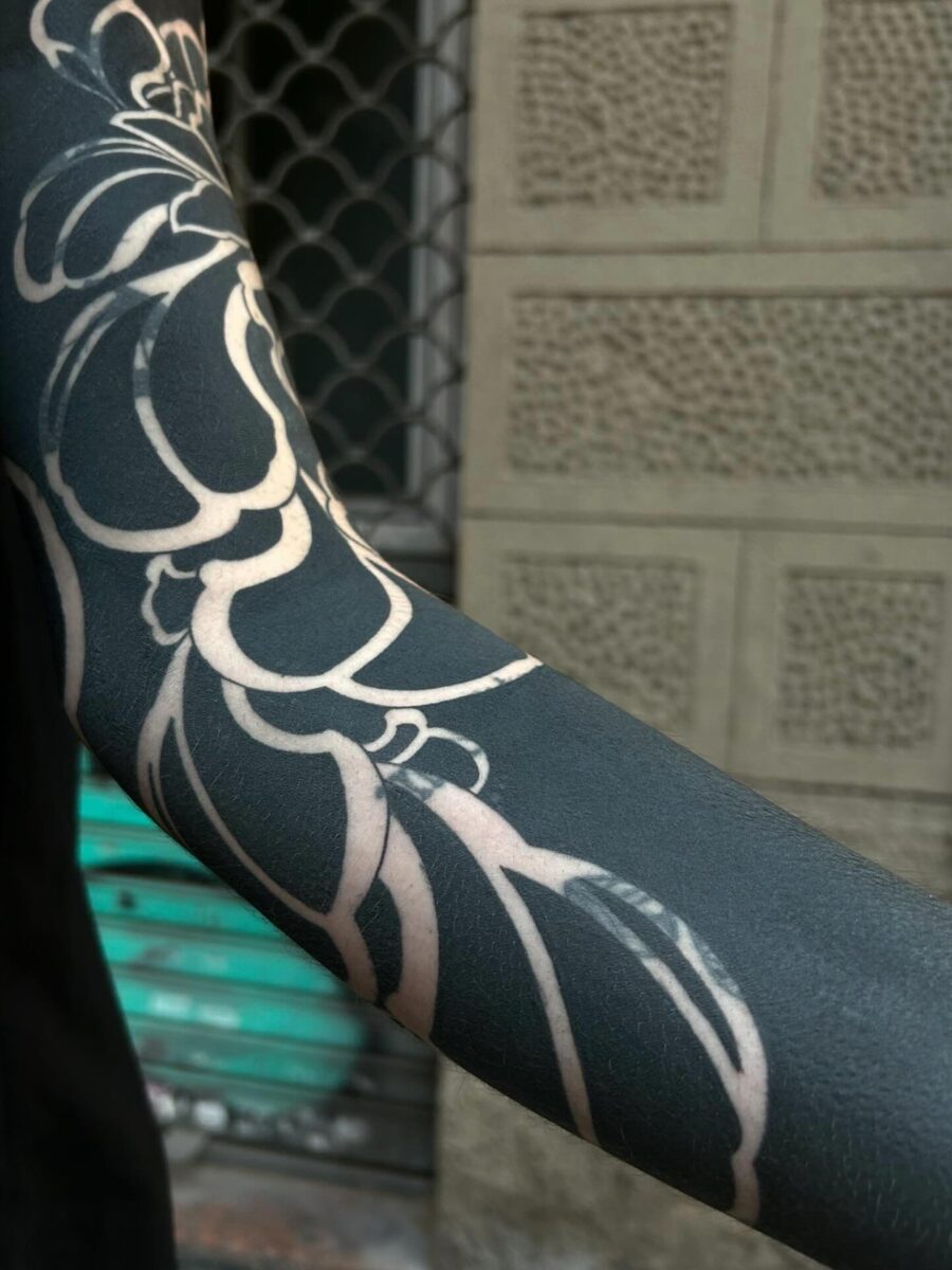 Elegant floral black sleeve tattoo design Tattoo on skin