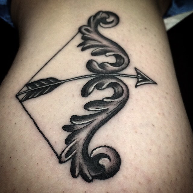 A Bow to Fit Any Body Arrow Tattoo Tattoo on skin