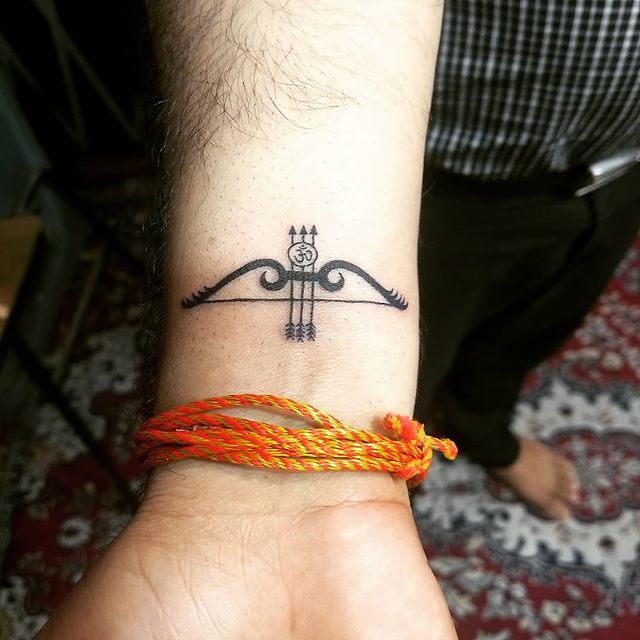 Middle Eastern Bow & Arrows Arrow Tattoo Tattoo on skin