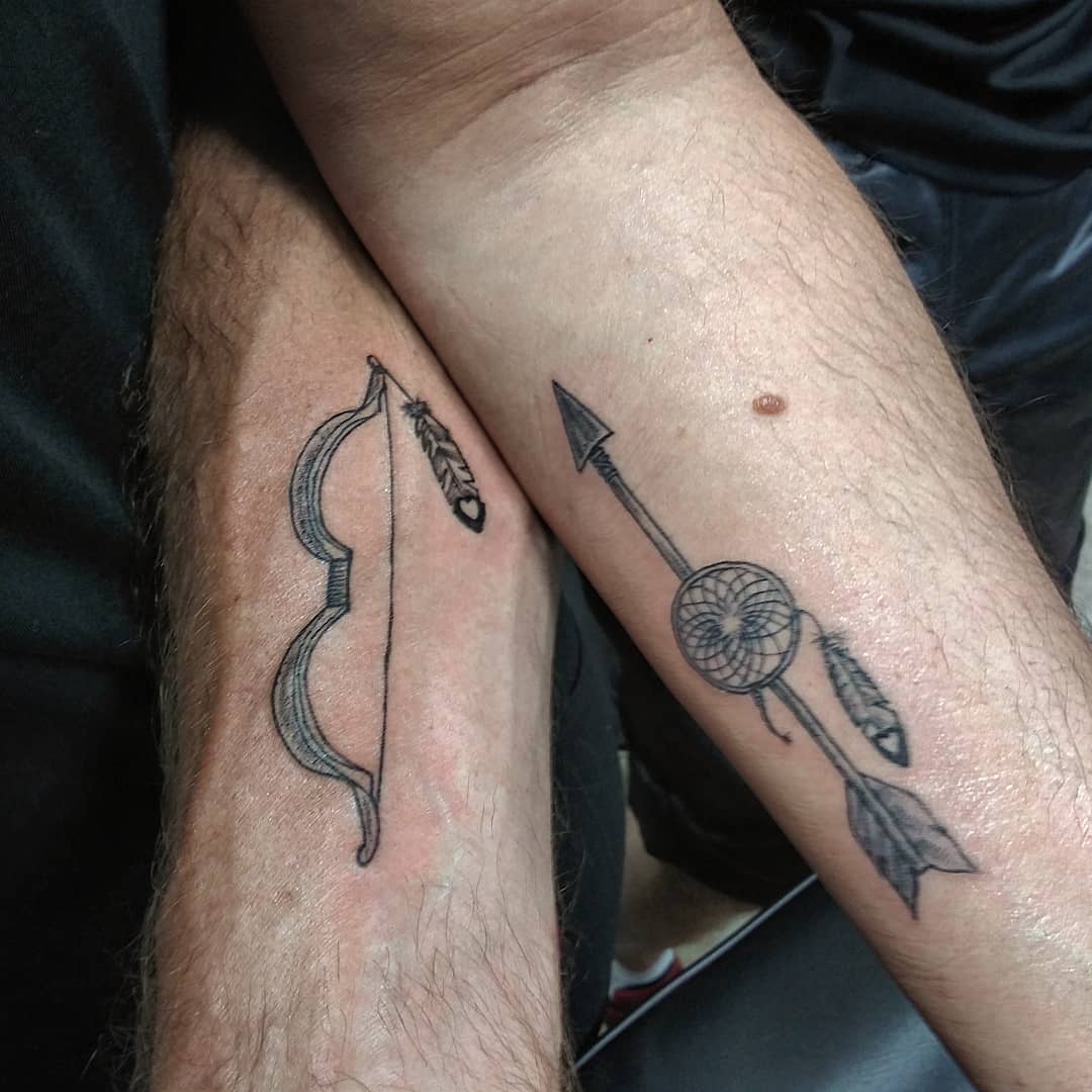 Native American Feather Tattoo Bow & Dreamcatcher Arrow Tattoo Tattoo on skin