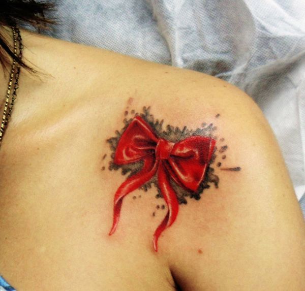 Decorative bow designs Tattoo on skin