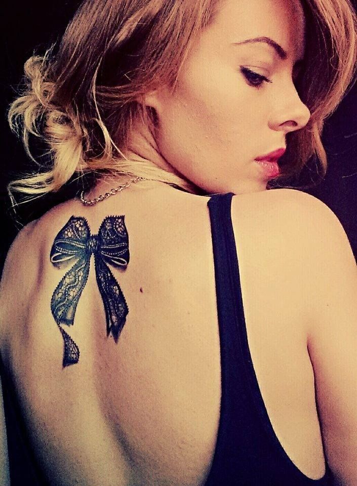 Bow tattoo meanings Tattoo on skin