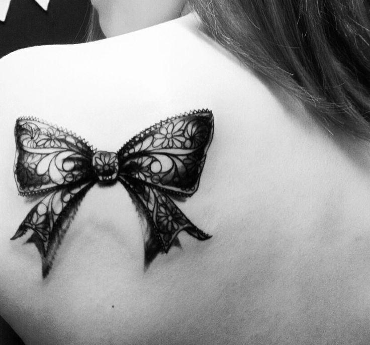 Thigh bow tattoo art Tattoo on skin