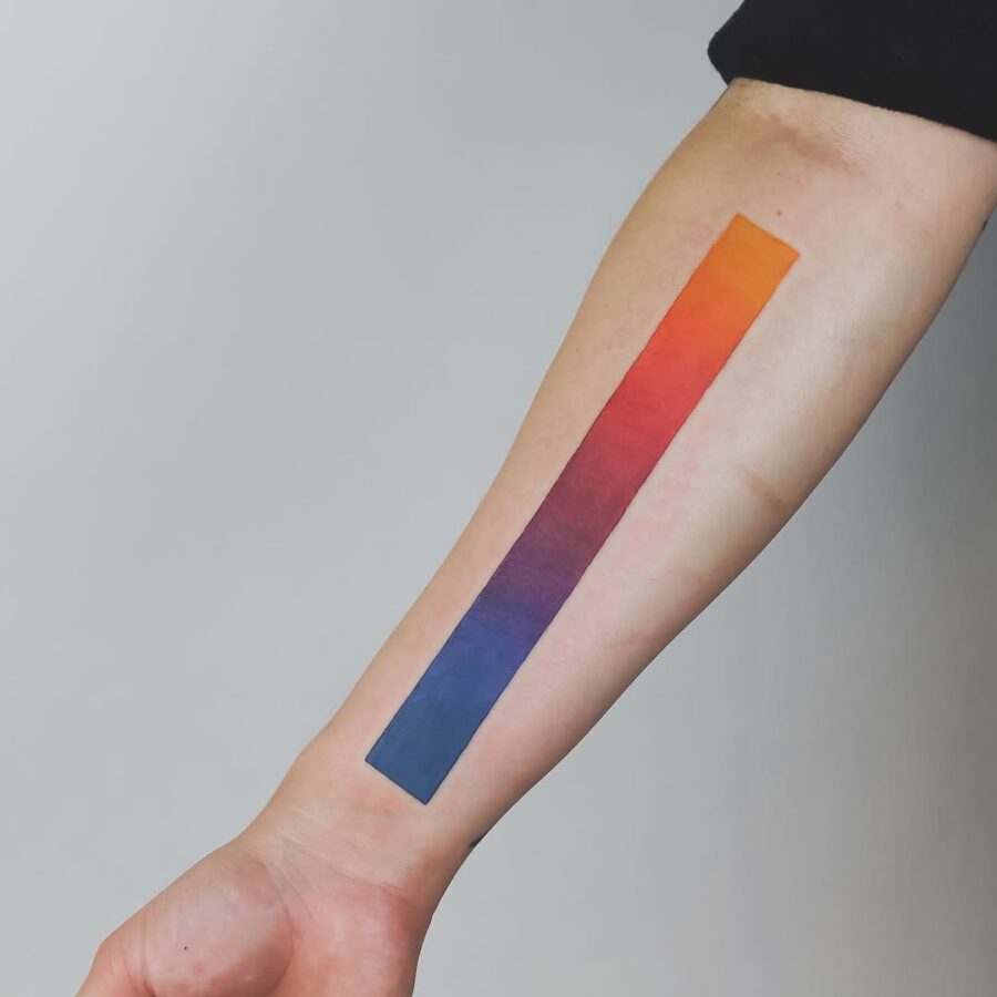 Bold Gradient Tattoo Showcasing Vibrant Colors Tattoo on skin