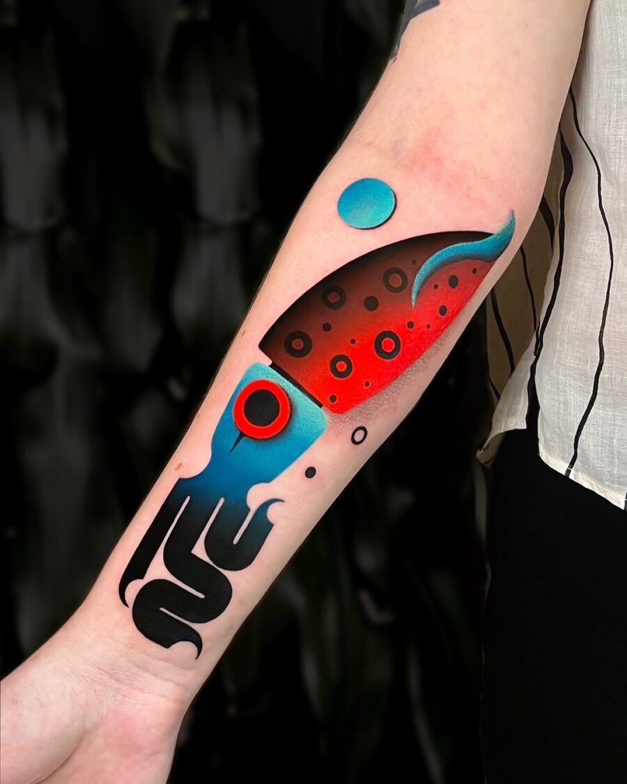 Bold squid tattoo with vivid colors Tattoo on skin