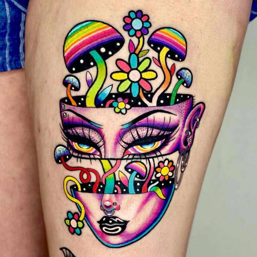 Colorful tattoo featuring mushrooms and floral designs Tattoo on skin
