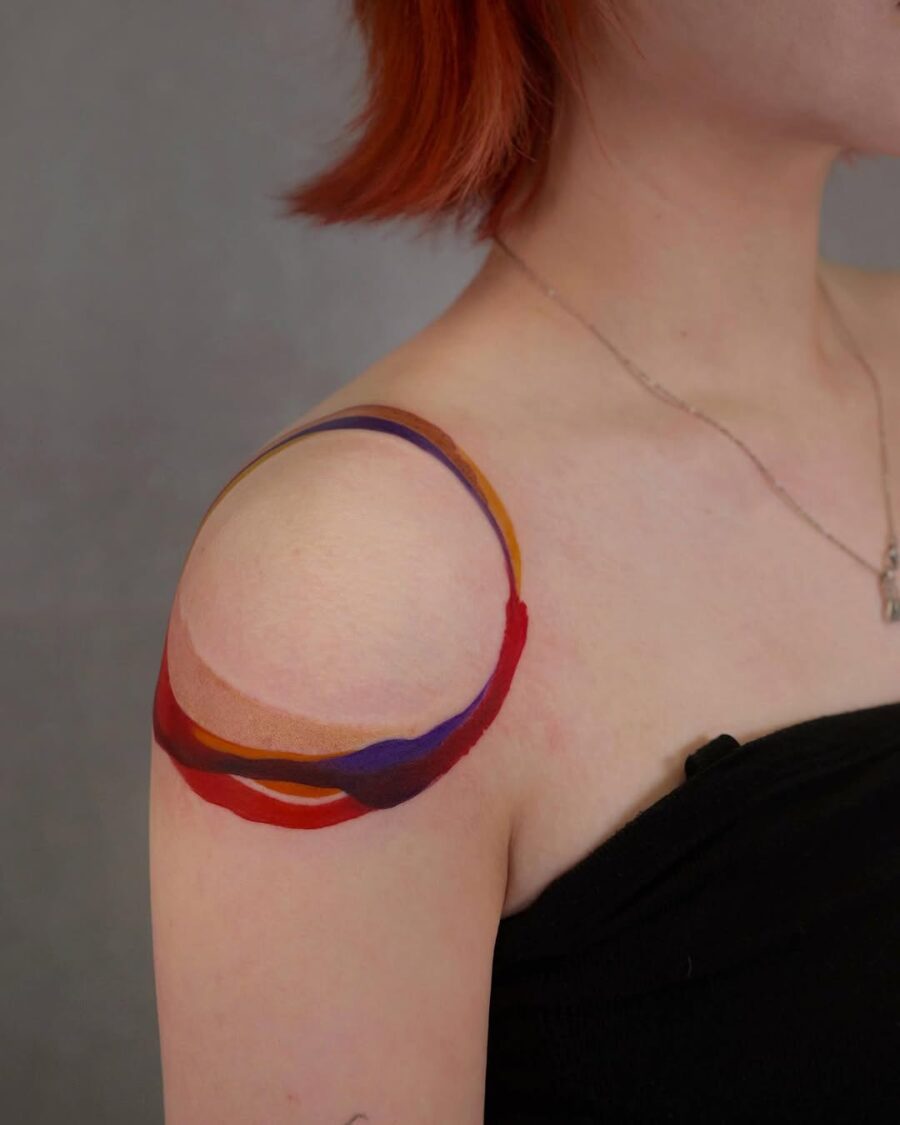 Vibrant and flowing shoulder tattoo design Tattoo on skin