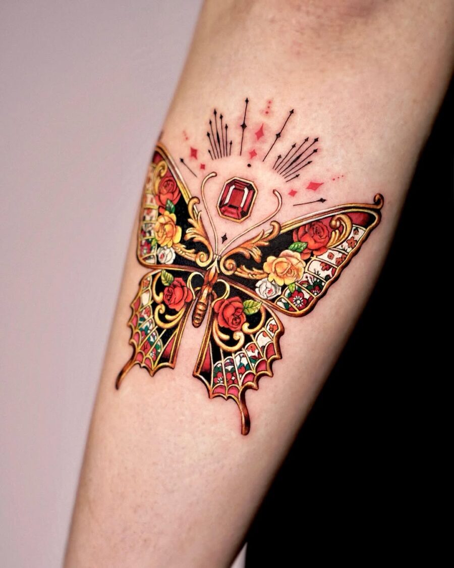 Vibrant butterfly tattoo with floral accents Tattoo on skin
