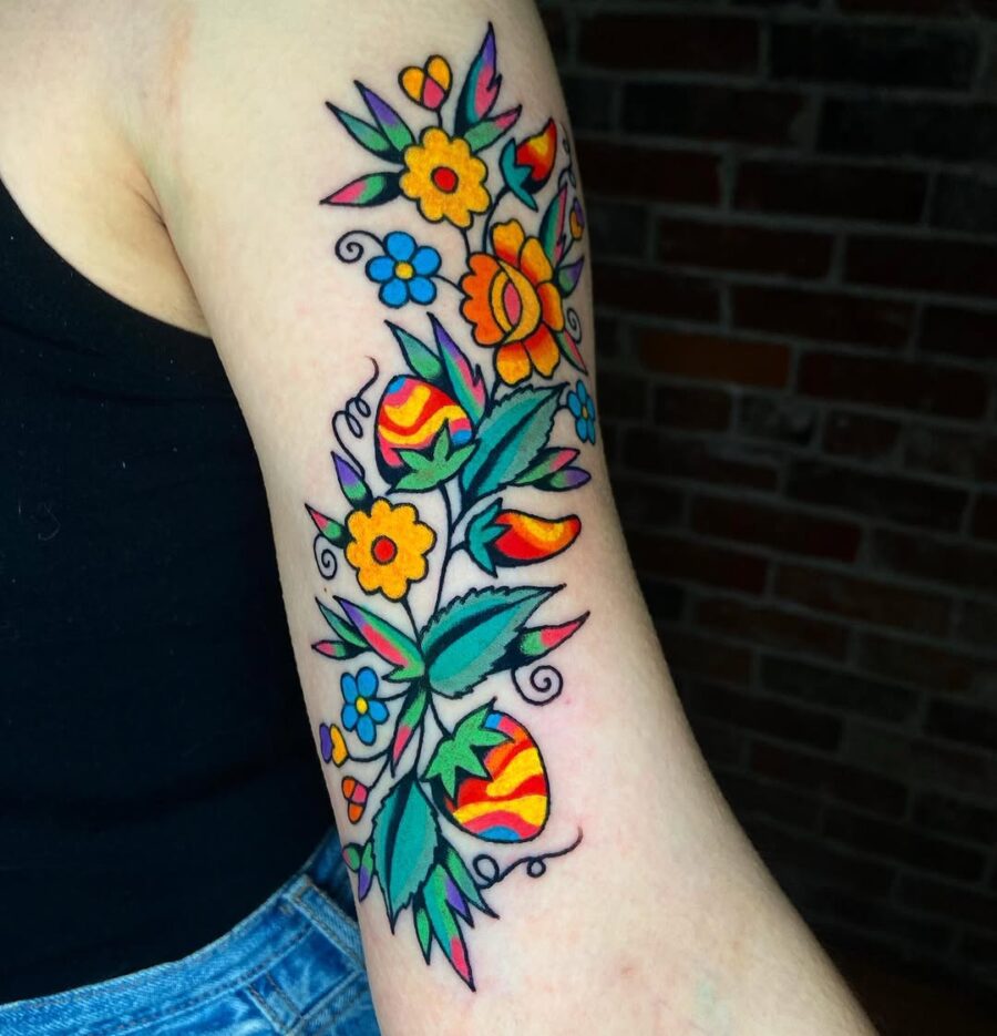 Vibrant floral tattoo bringing cheerful vibes Tattoo on skin