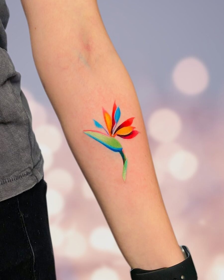 Vibrant flower tattoo with bold color contrast Tattoo on skin