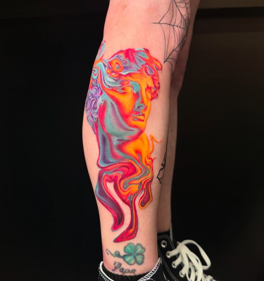 Vibrant Pop Art Tattoo of a Classic Figure Tattoo on skin