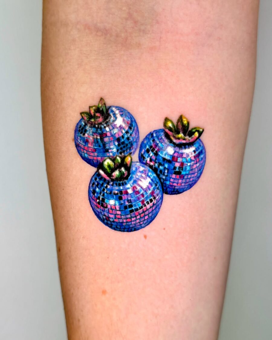 Vibrant pumpkin tattoos radiate playful energy Tattoo on skin