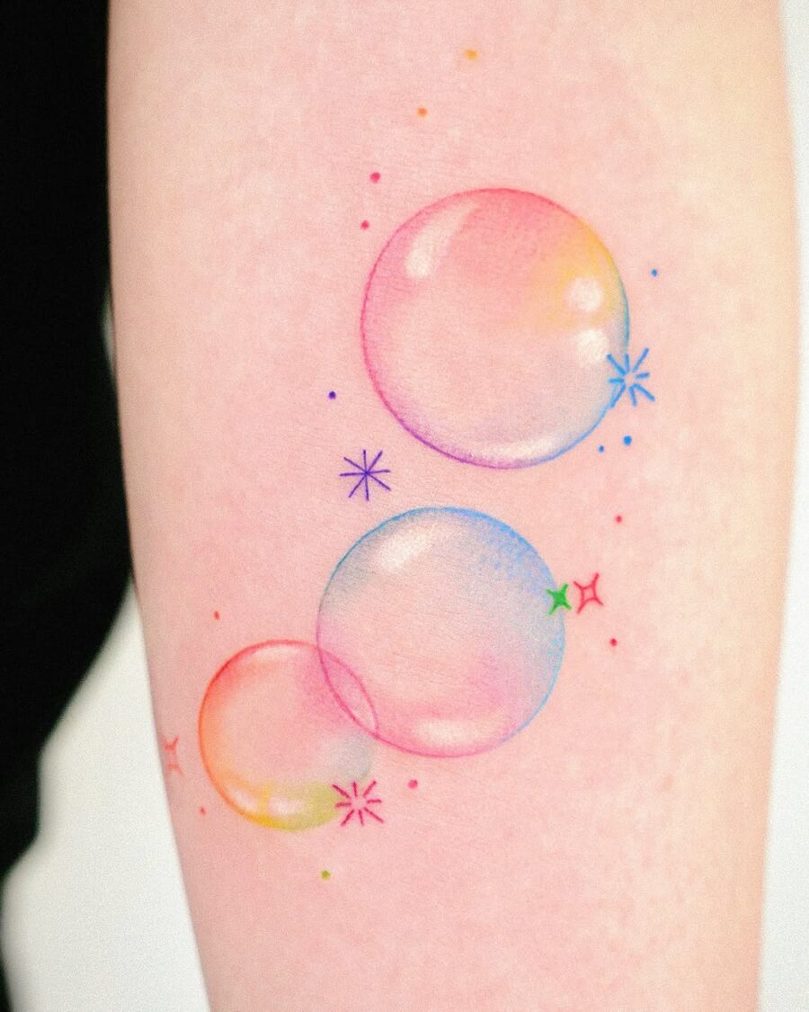 Whimsical bubble tattoo in vibrant colors Tattoo on skin