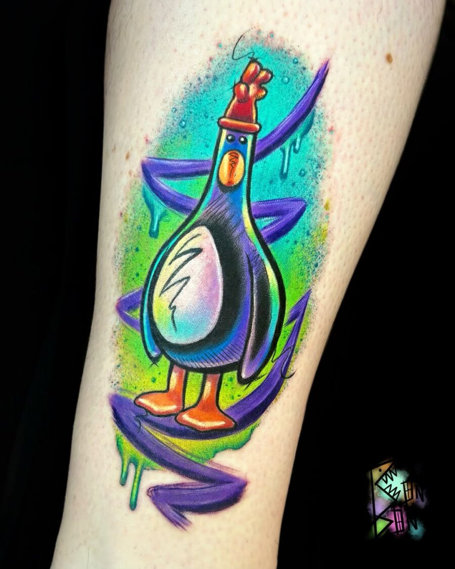 Whimsical pigeon tattoo bursting with color Tattoo on skin