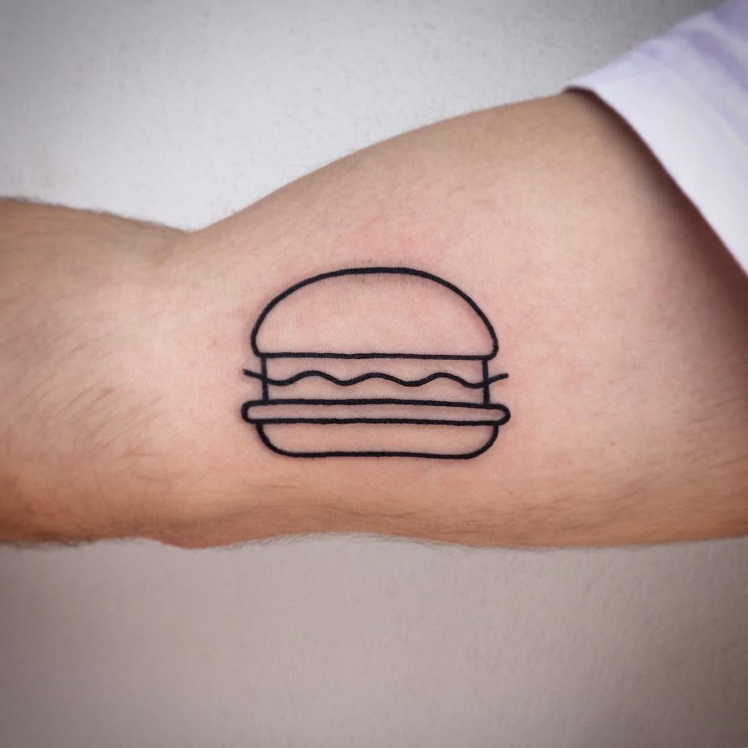 A Burger Tattoo Delight Tattoo on skin