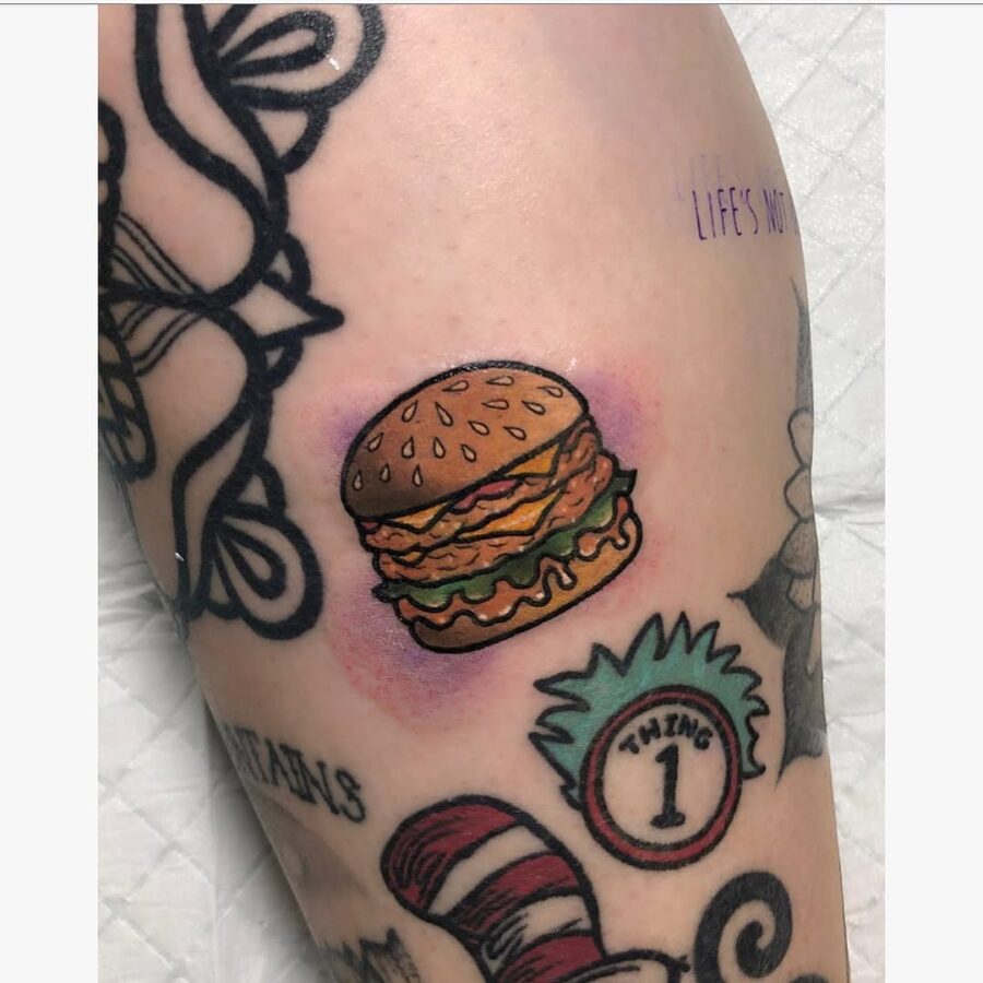 A vibrant burger tattoo with a playful vibe Tattoo on skin