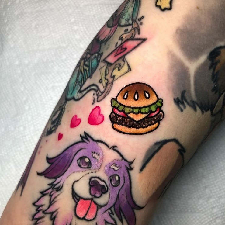 Cute burger tattoo with vibrant cartoon style Tattoo on skin