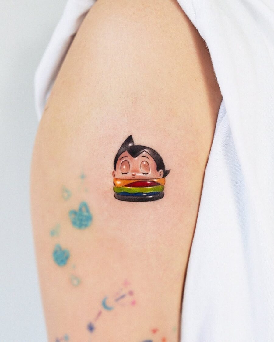 Cute character with a burger tattoo Tattoo on skin