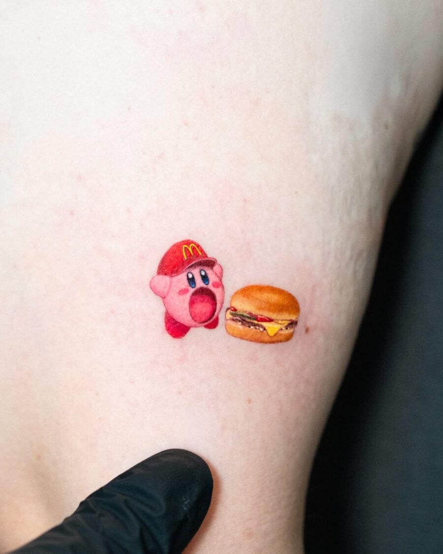Cute Kirby with a Tasty Burger Tattoo Tattoo on skin