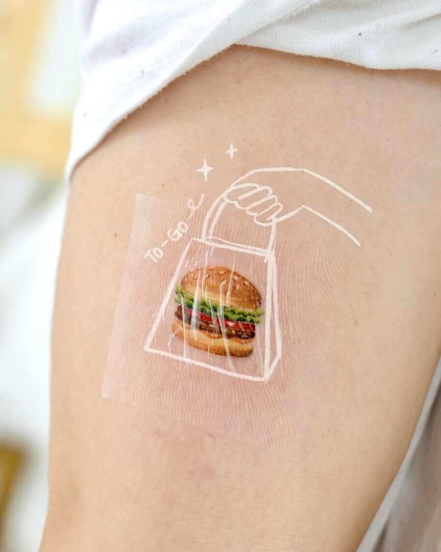 Delicious burger tattoo perfect for food lovers Tattoo on skin