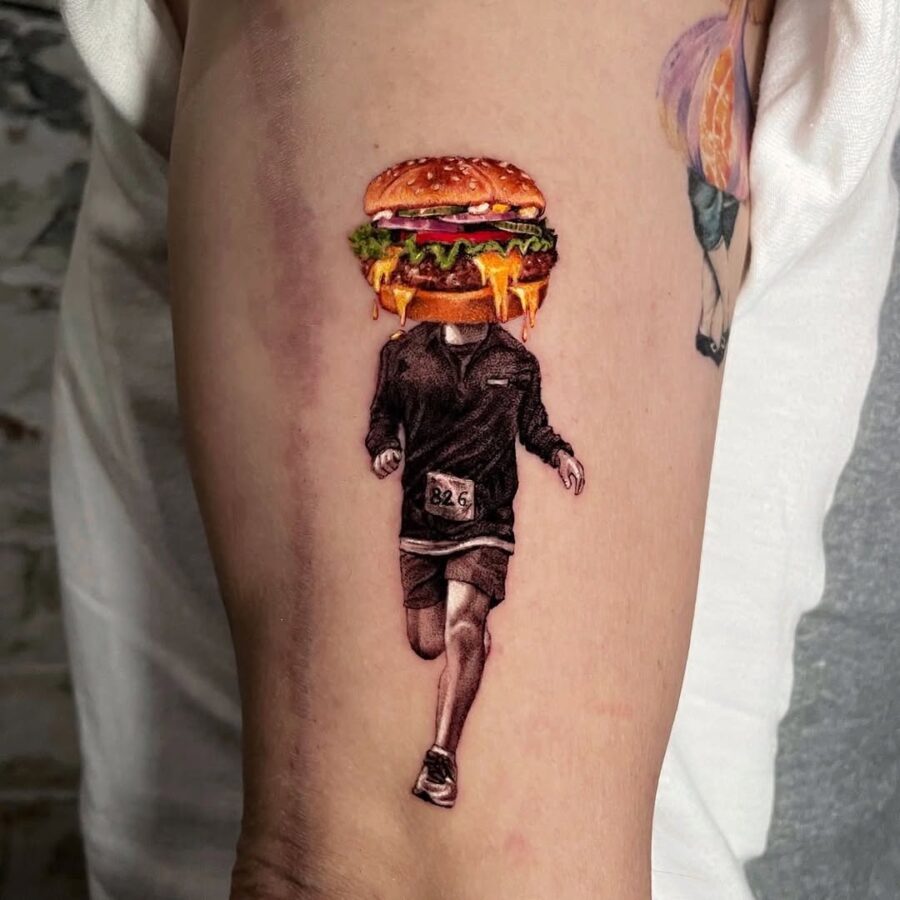 Unique burger-themed runner tattoo concept Tattoo on skin