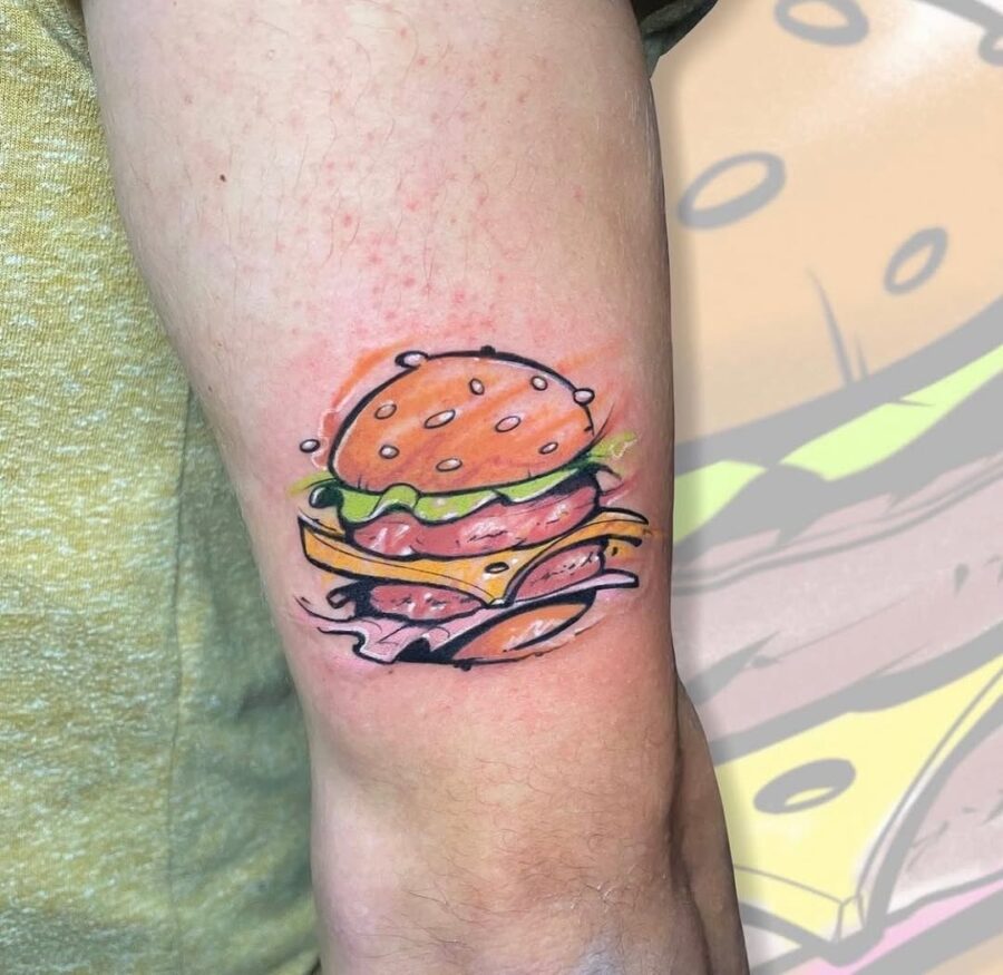 Vibrant burger tattoo showcasing delicious layers Tattoo on skin