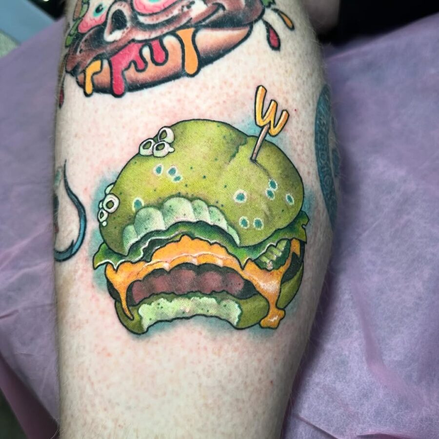 Vibrant cartoon burger tattoo with playful details Tattoo on skin
