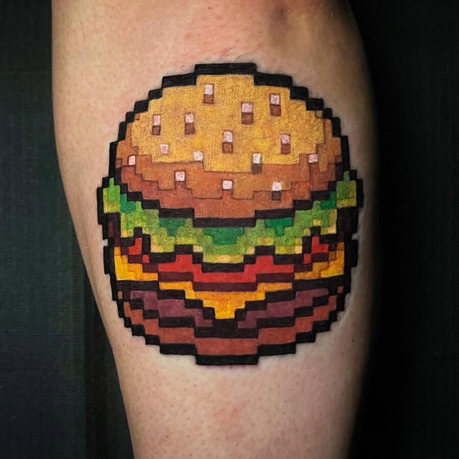 Vibrant pixel art burger tattoo design Tattoo on skin