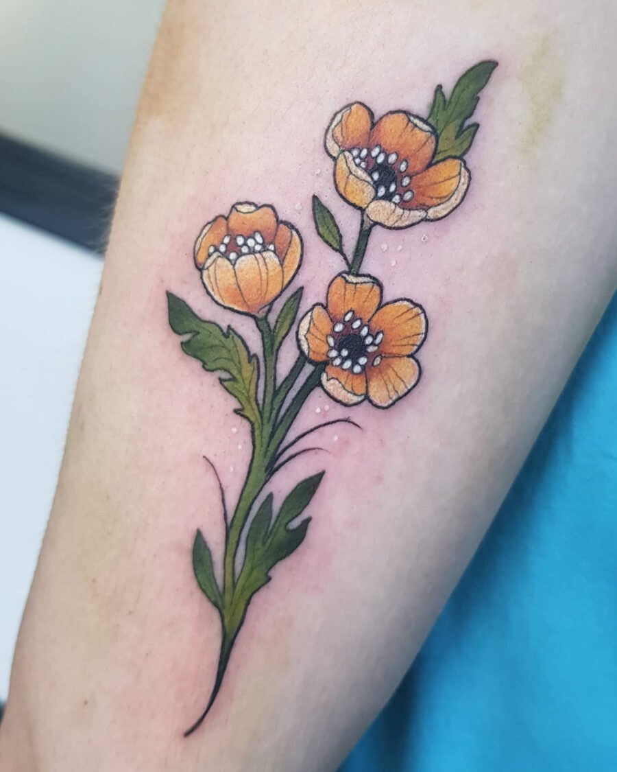 Delicate buttercup floral tattoo design on arm Tattoo on skin