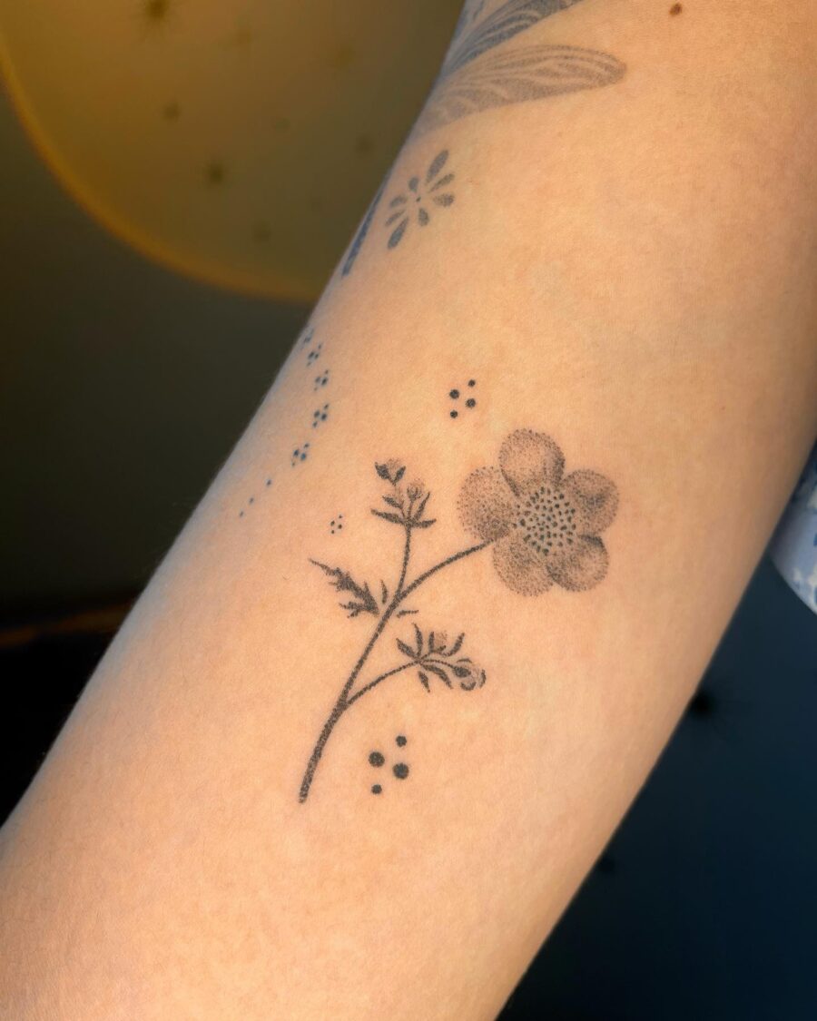 Delicate buttercup flower tattoo design on skin Tattoo on skin