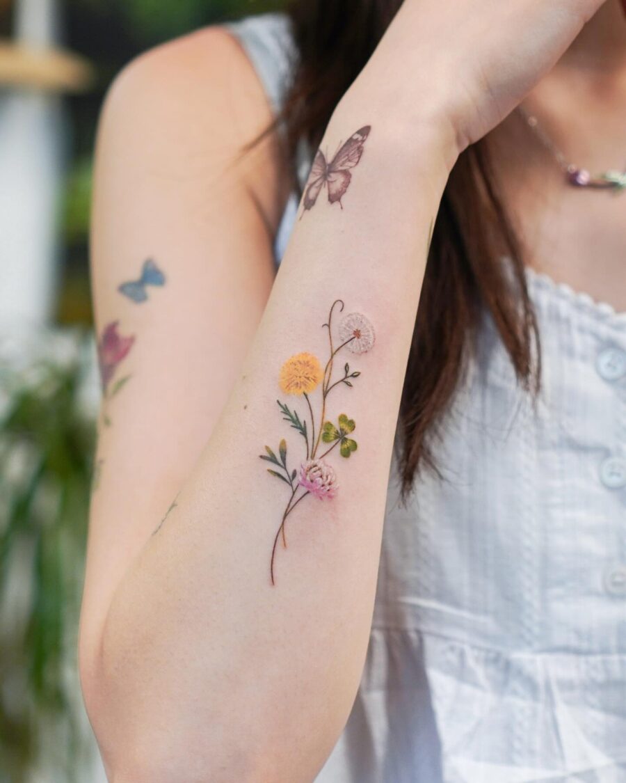 Elegant floral tattoos celebrating nature's beauty Tattoo on skin
