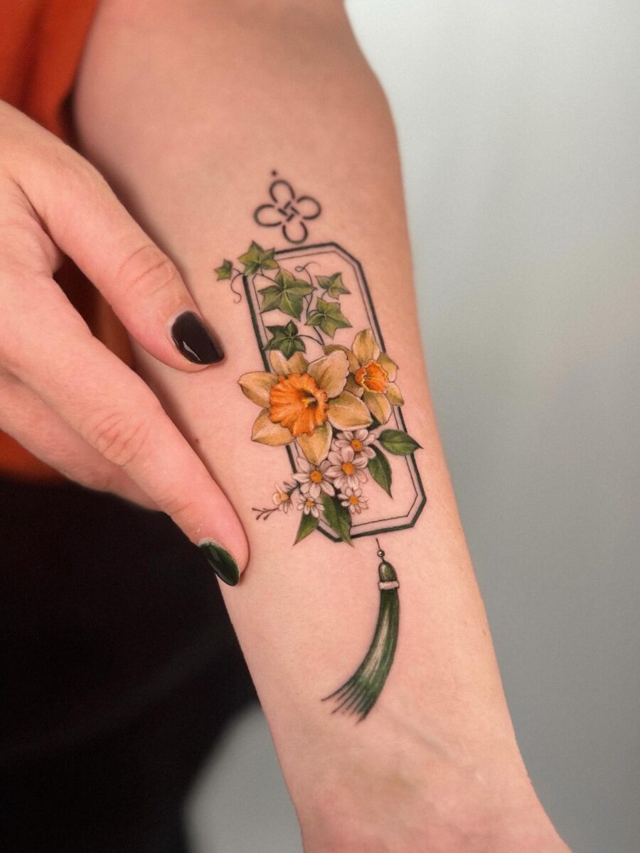 Vibrant buttercup tattoo with elegant detailing Tattoo on skin