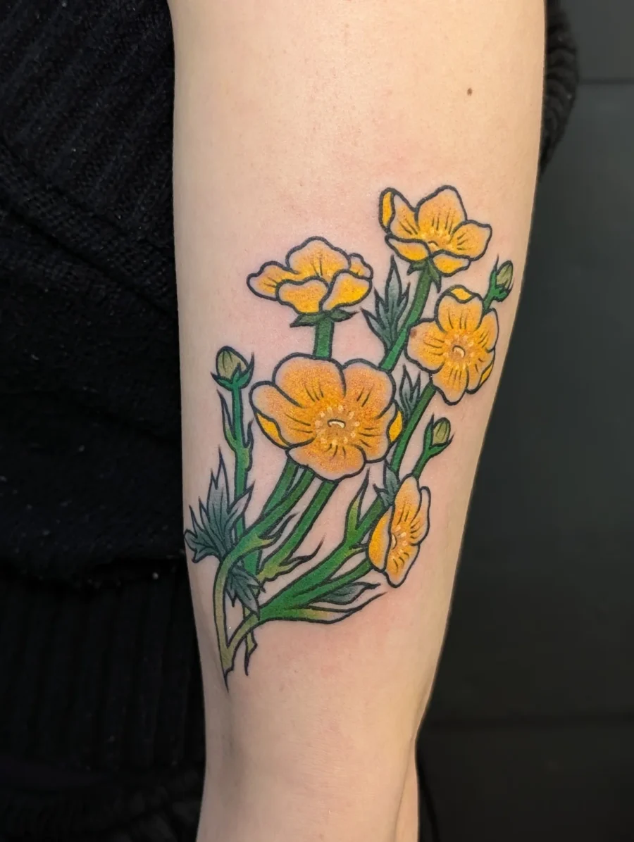 Vibrant buttercup tattoos exuding natural beauty Tattoo on skin