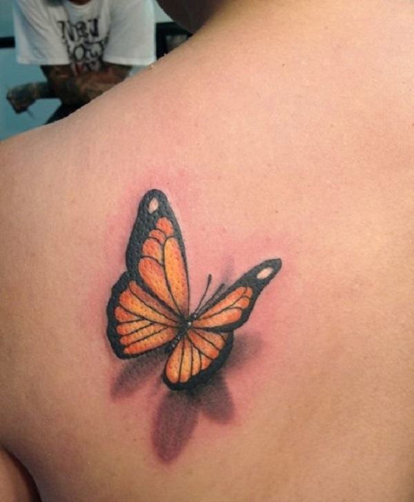 A cool orange tattoo on the back Tattoo on skin