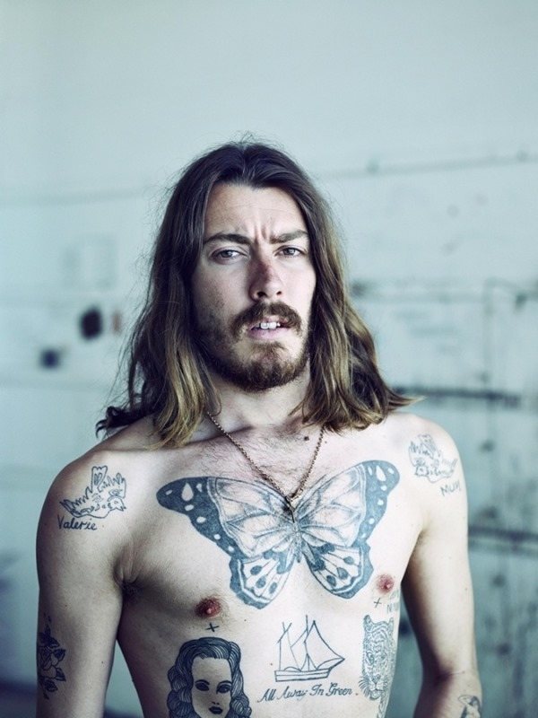 A Dazzling Work of Art on Man's Chest Tattoo on skin