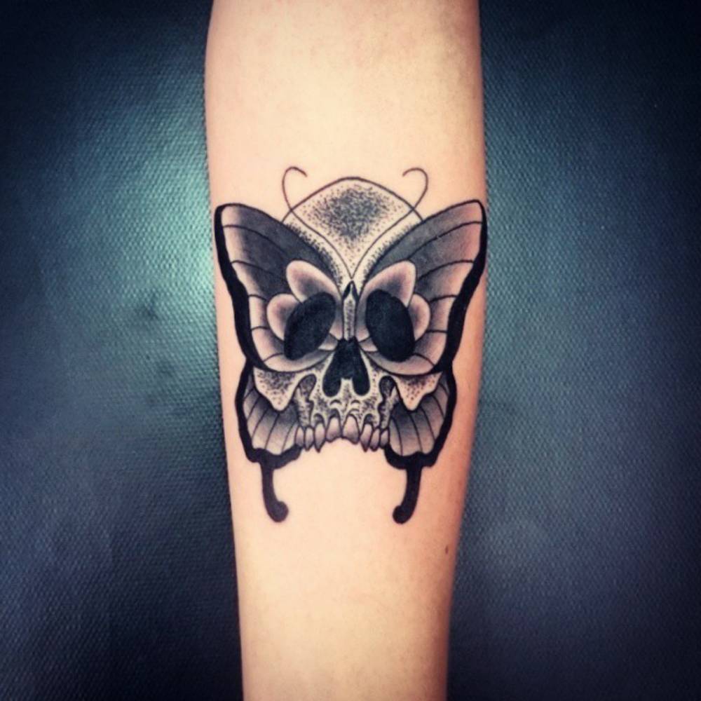 Butterfly Skull Forearm Tattoo Tattoo on skin