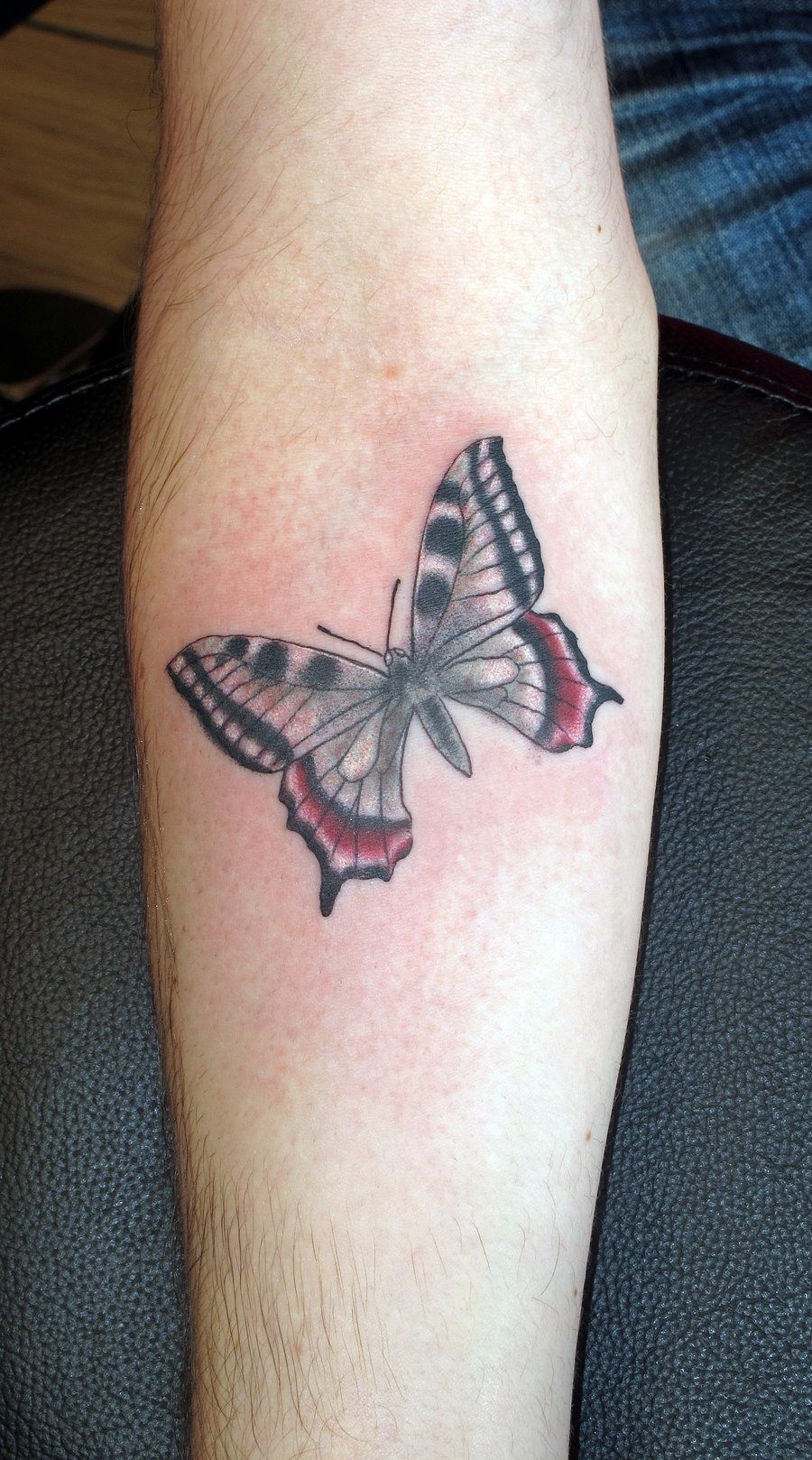 Butterfly Tattoo with Vibrant Colors Tattoo on skin