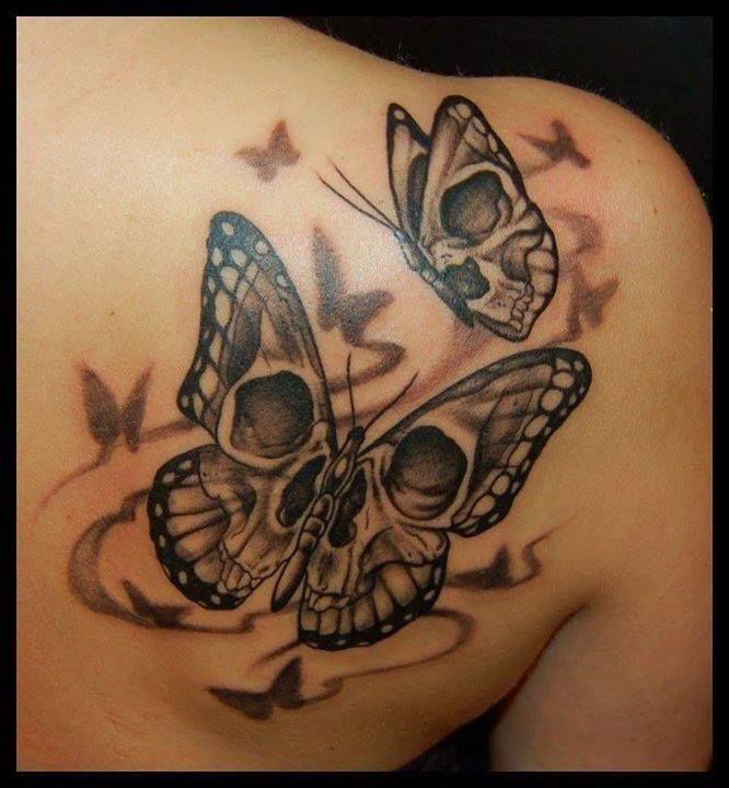 Hollow Skull-Winged Butterflies Tattoo on skin
